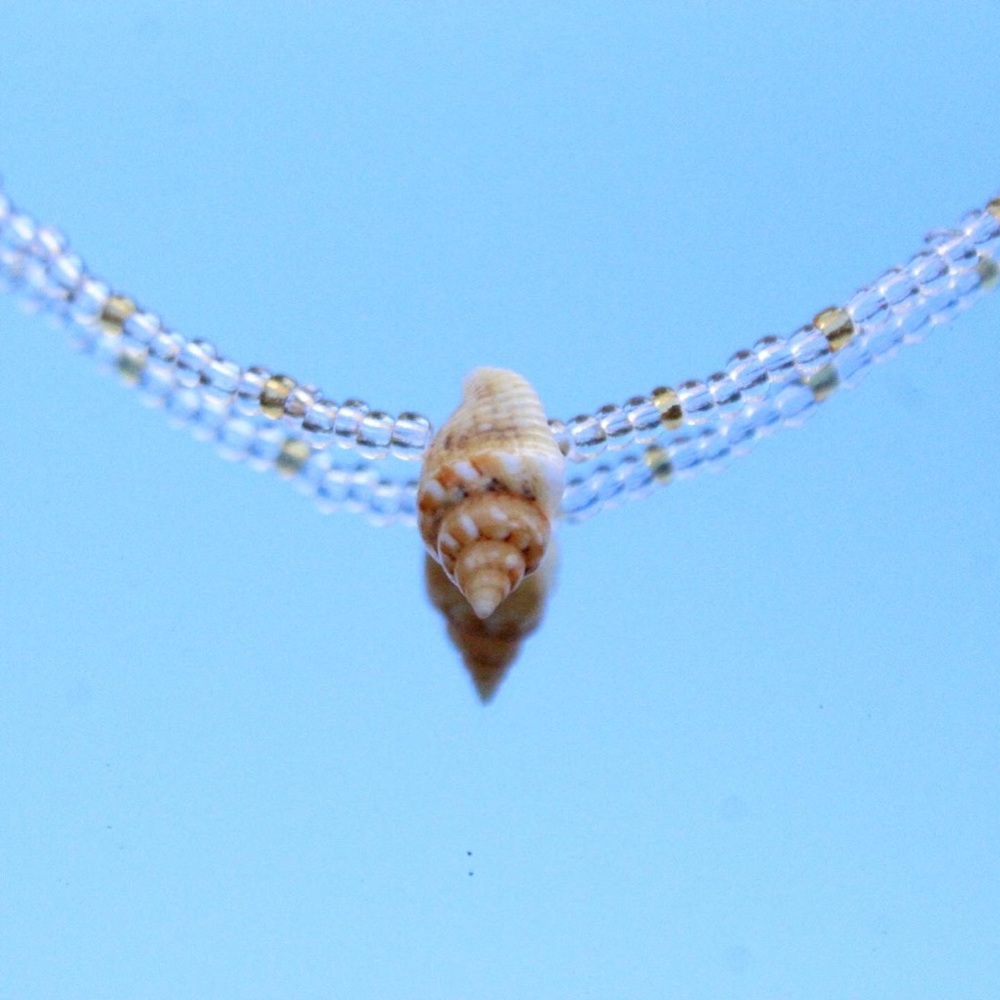 Clear and gold shell necklace